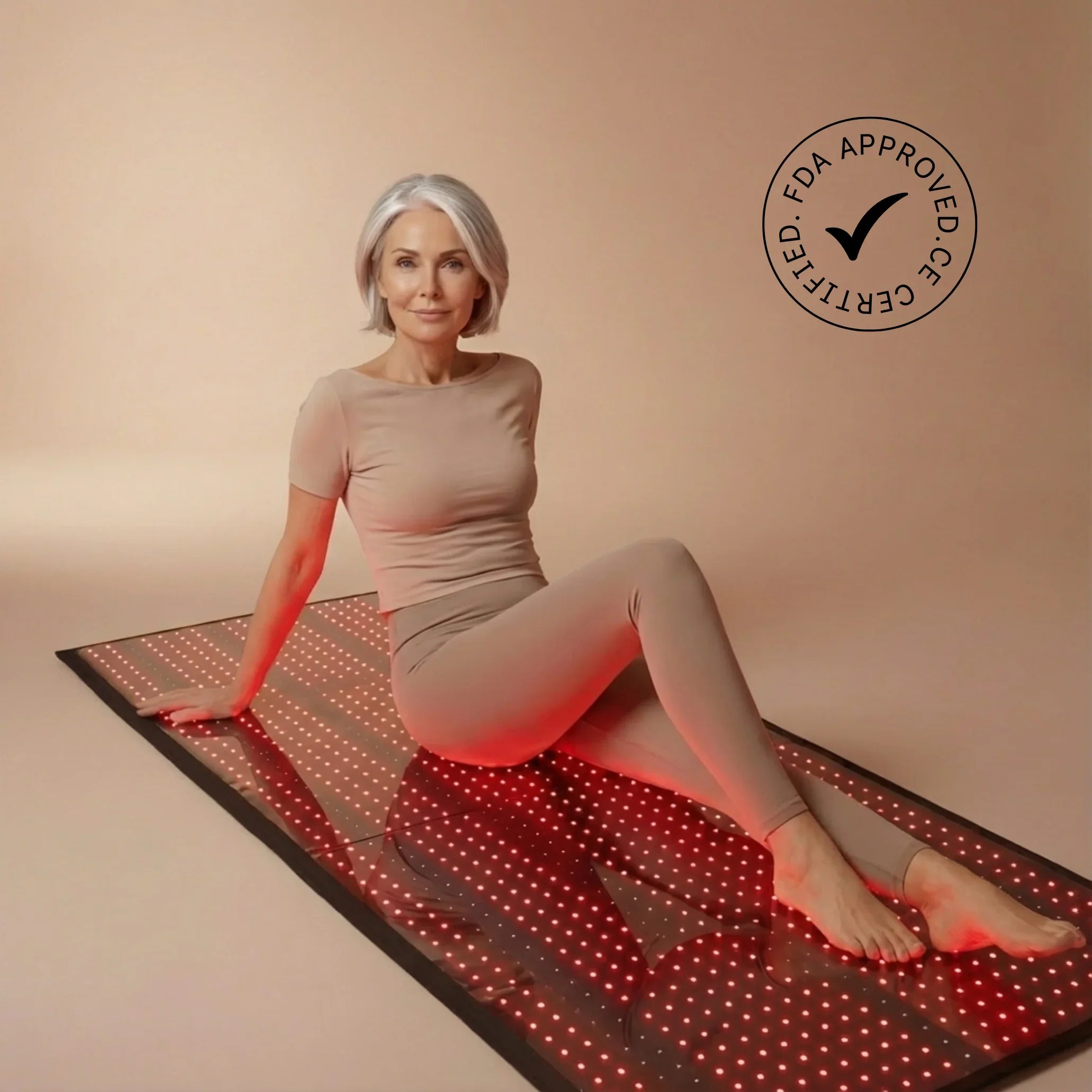 Woman using Nicebeam Full Body Red Light Therapy Mat with red light glowing, promoting skin rejuvenation and cellular recovery.